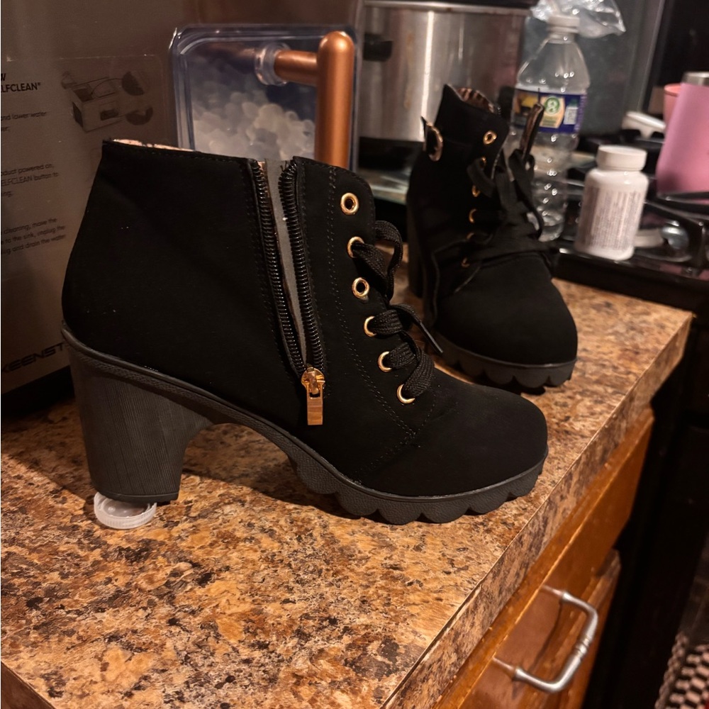 Elegant Black Ankle Boots with Gold Details